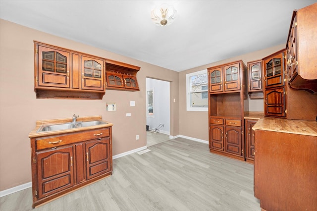 kitchen featuring sink and light hardwood / wood-style floors