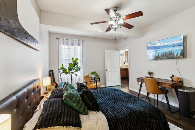 bedroom featuring dark hardwood / wood-style floors and ceiling fan