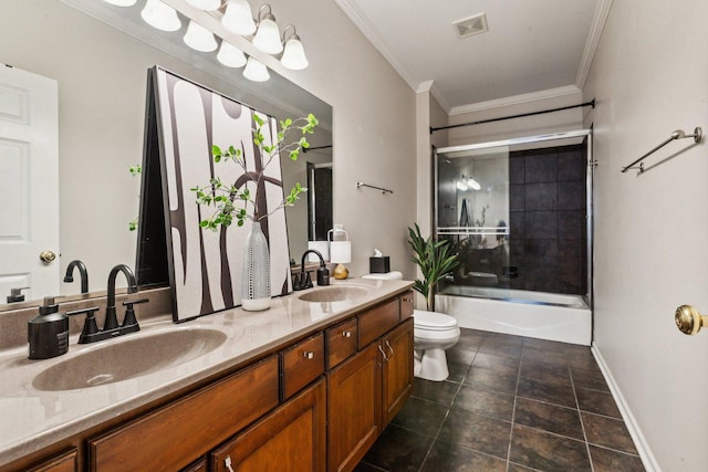 full bathroom with toilet, crown molding, bath / shower combo with glass door, vanity, and tile patterned flooring