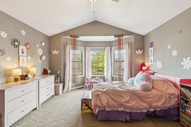 carpeted bedroom featuring ceiling fan and vaulted ceiling