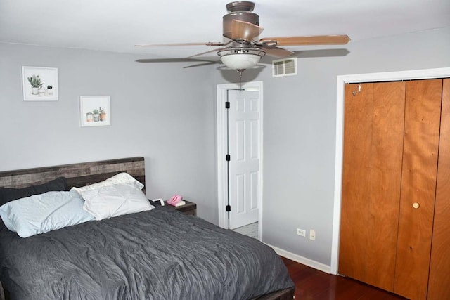 bedroom featuring dark wood-type flooring and ceiling fan