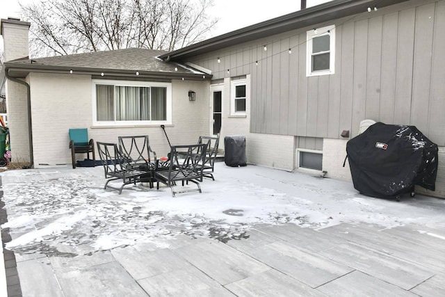 view of snow covered house