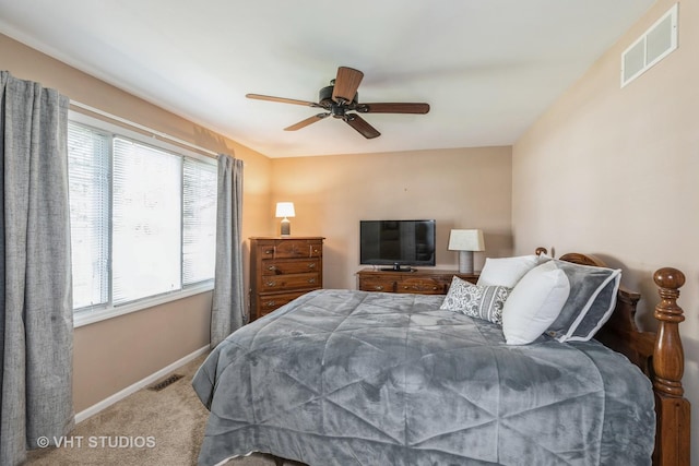 bedroom with ceiling fan and carpet flooring