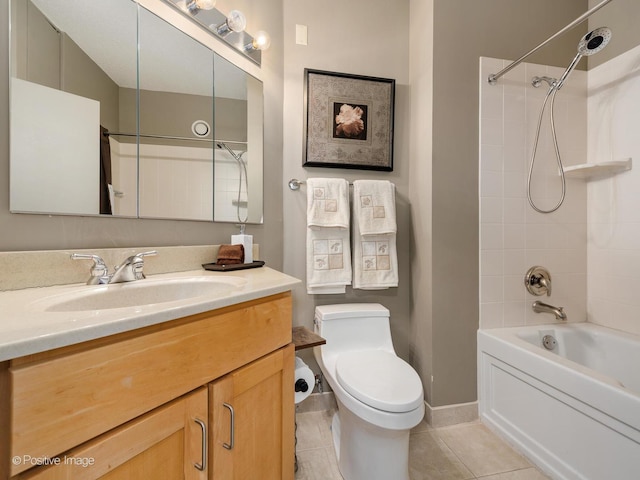 bathroom with tile patterned flooring, toilet, vanity, baseboards, and shower / washtub combination