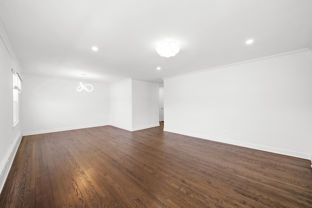 unfurnished room with ornamental molding and dark hardwood / wood-style floors