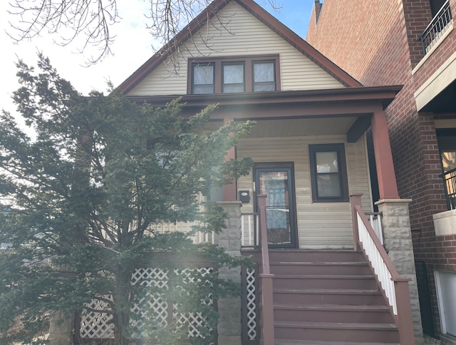 entrance to property with covered porch