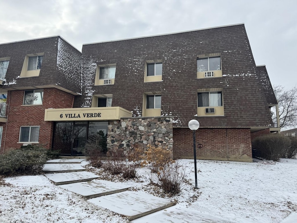 view of snow covered property