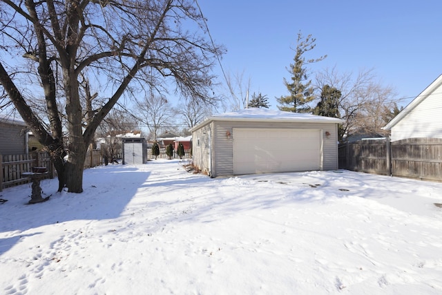 view of snow covered garage