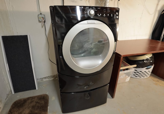 washroom with washer / dryer