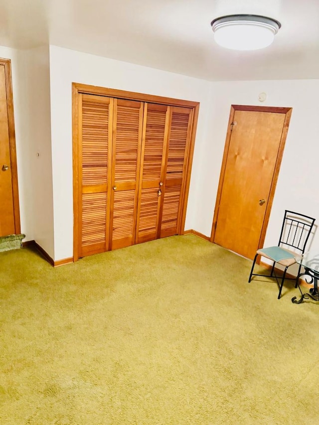 unfurnished room with carpet floors