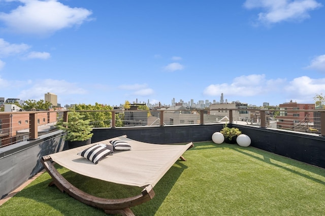 view of yard featuring a balcony