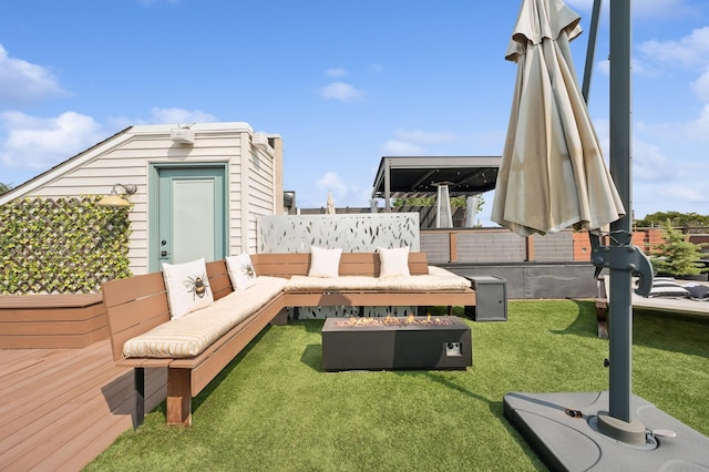 exterior space featuring outdoor lounge area and a lawn