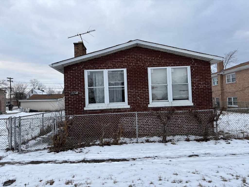 view of snow covered property