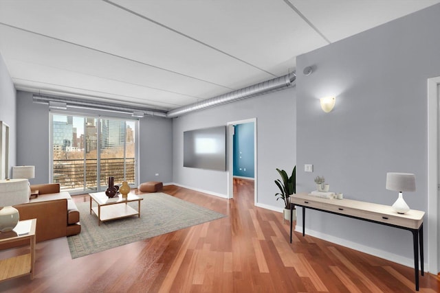 living room with hardwood / wood-style flooring