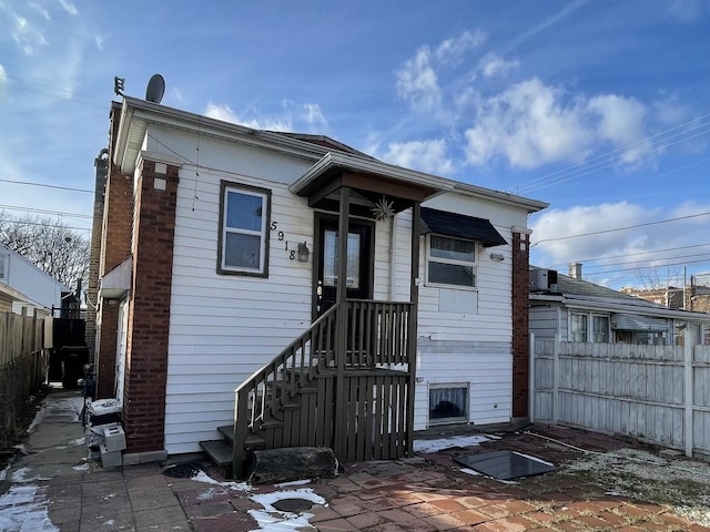 back of house with a patio area