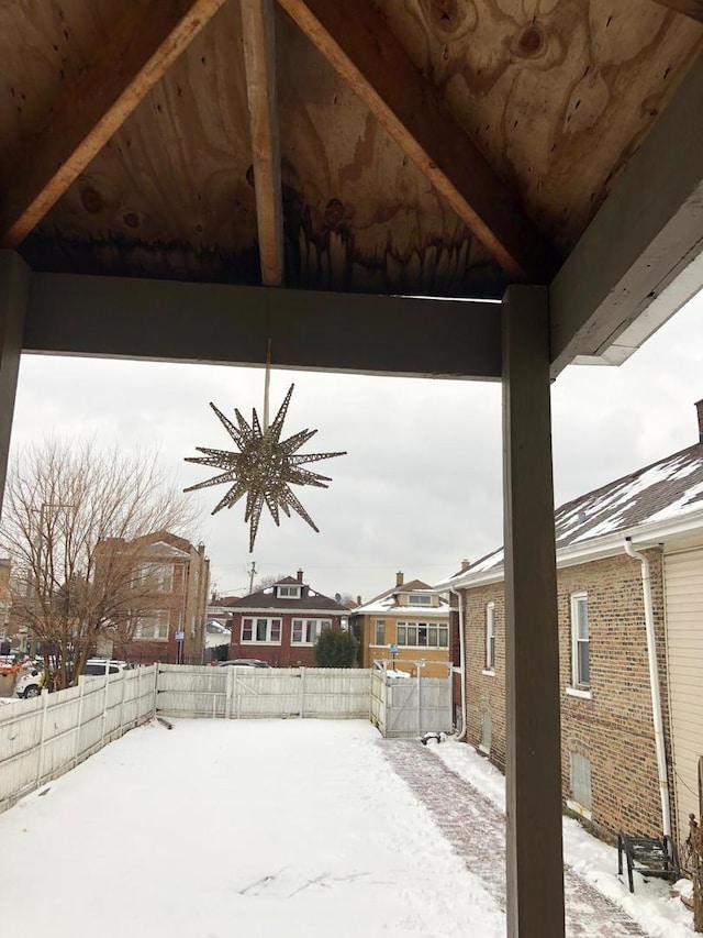 view of snow covered patio