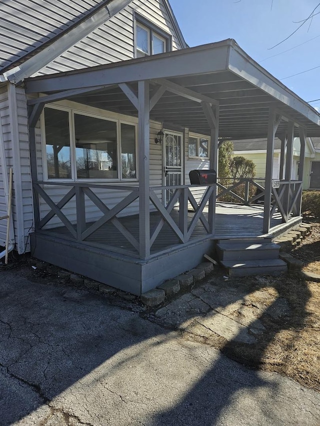 exterior space with a carport