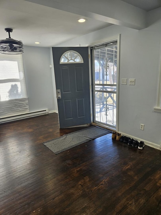 foyer with baseboards, baseboard heating, hardwood / wood-style floors, and recessed lighting