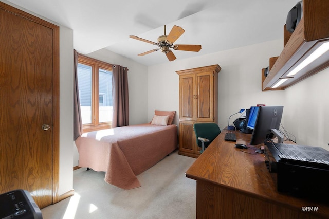 bedroom featuring ceiling fan and light colored carpet