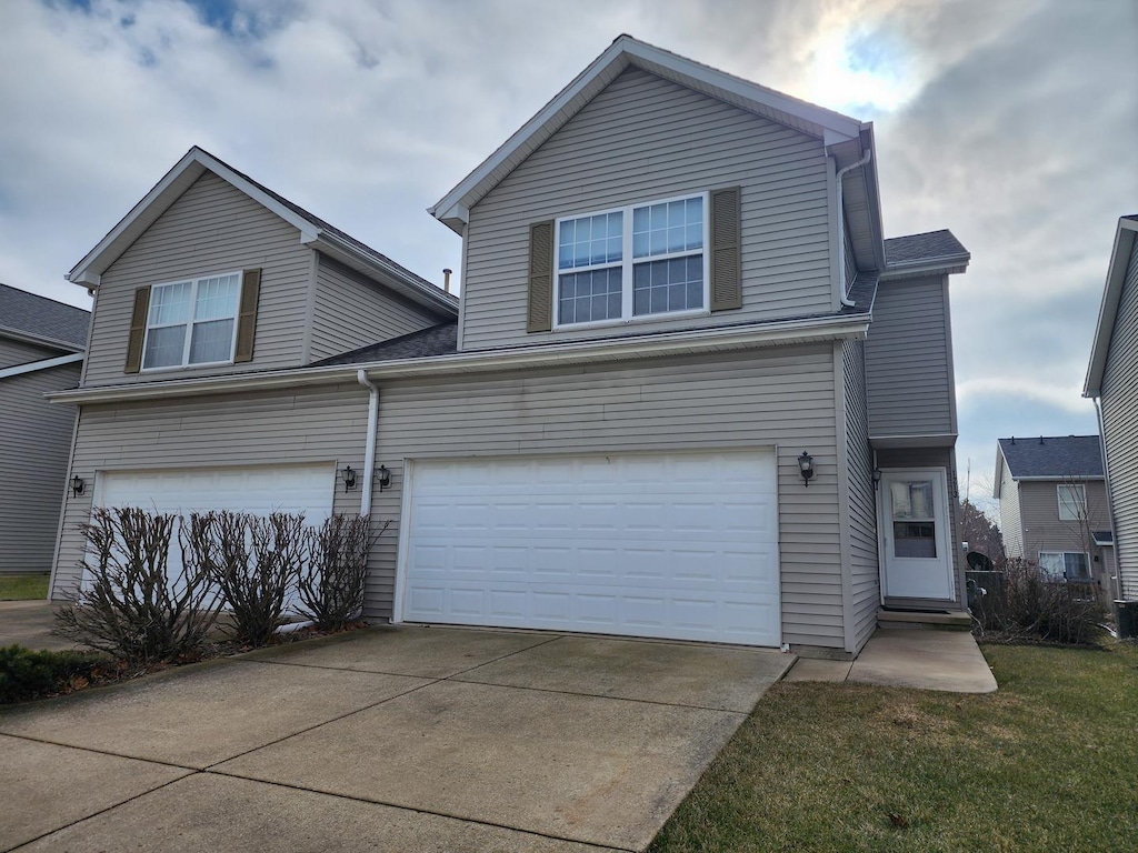 front of property featuring a garage