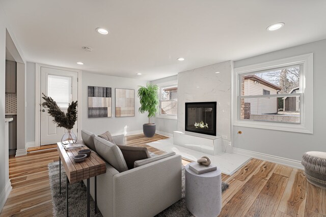 unfurnished bedroom featuring crown molding, a closet, and light hardwood / wood-style flooring