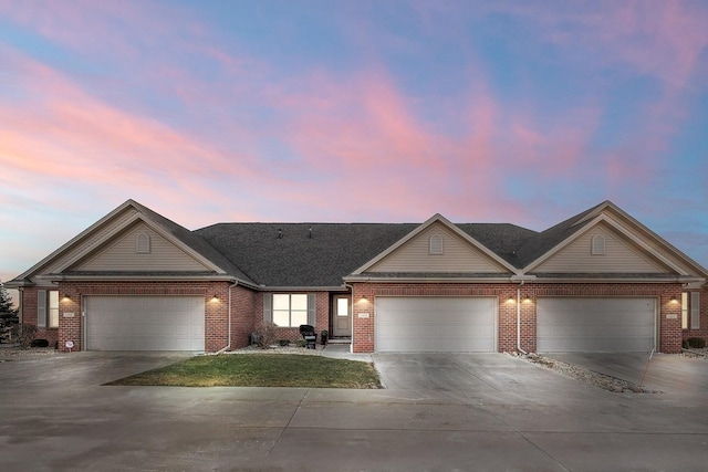 single story home featuring a garage