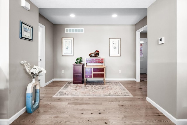 entrance foyer with light hardwood / wood-style floors