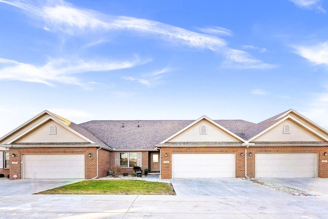 ranch-style house featuring a garage