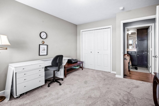 view of carpeted office space