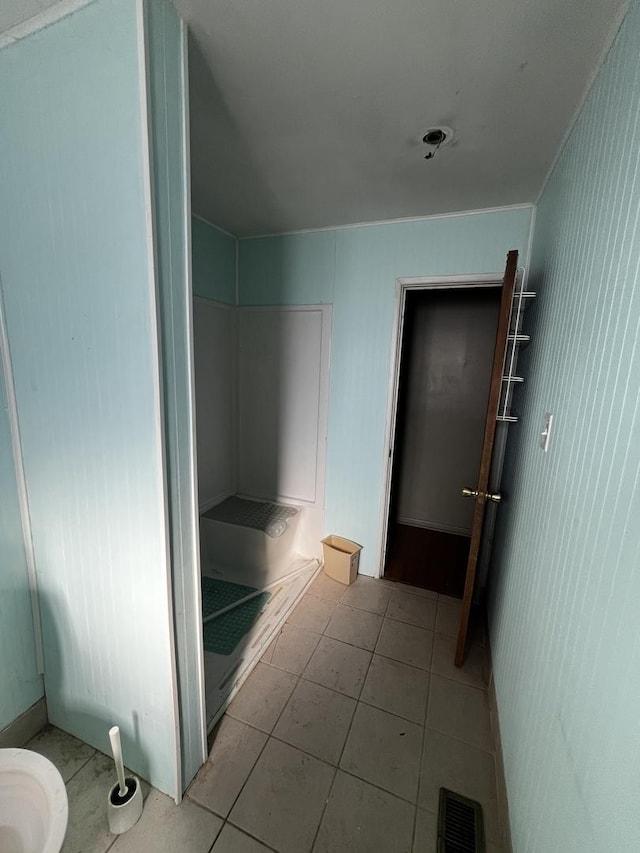 bathroom featuring tile patterned flooring