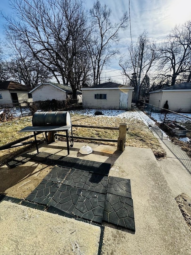 view of patio / terrace with an outbuilding