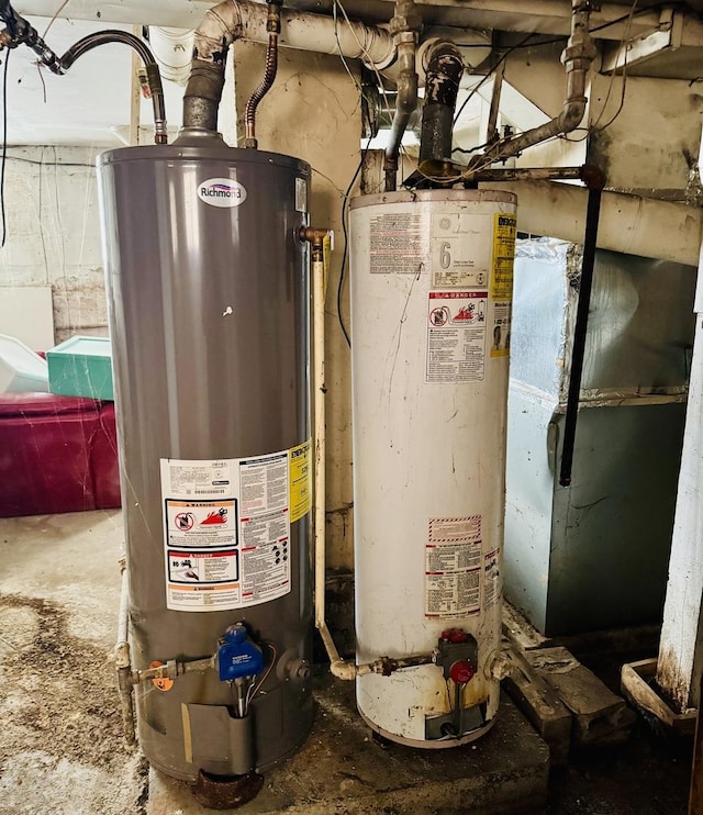 utility room featuring gas water heater