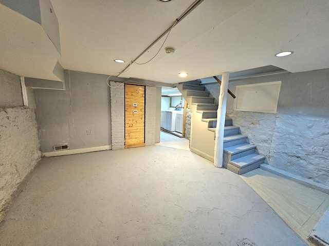 basement with independent washer and dryer