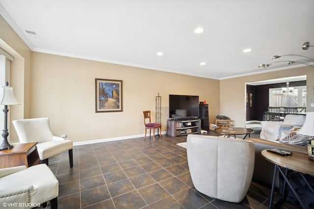 living room featuring ornamental molding, dark tile patterned flooring, and a chandelier