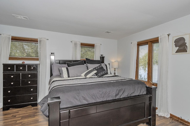 bedroom featuring hardwood / wood-style flooring