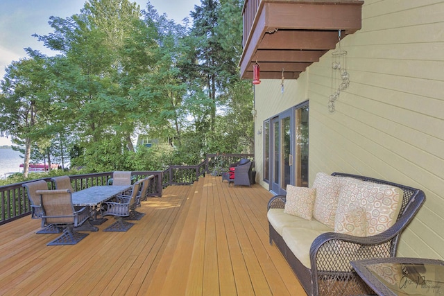 wooden deck featuring an outdoor hangout area