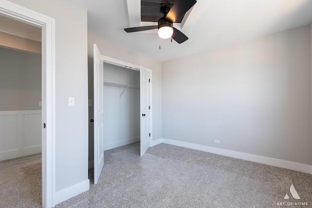 unfurnished bedroom with light carpet, ceiling fan, and a closet