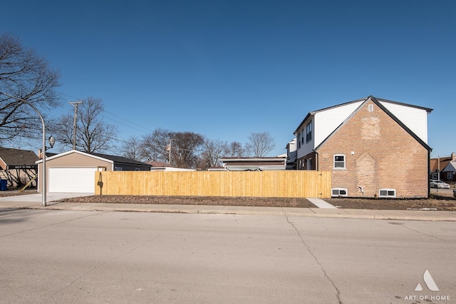 view of side of home featuring a garage