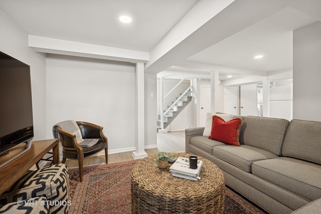 living area featuring recessed lighting, stairway, baseboards, and wood finished floors