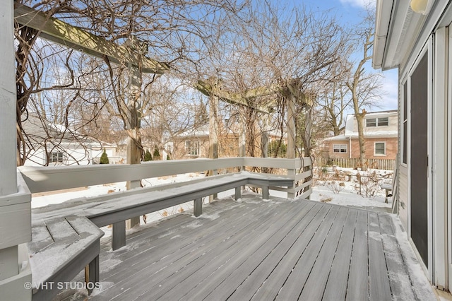 view of snow covered deck