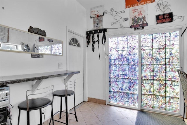 kitchen with light tile patterned floors