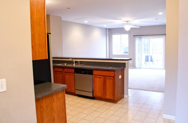 kitchen with dishwasher, sink, ceiling fan, kitchen peninsula, and light carpet