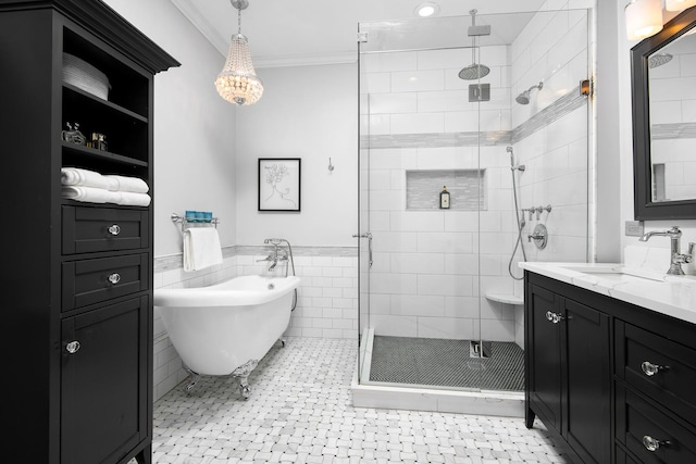 bathroom featuring tile walls, vanity, ornamental molding, tile patterned floors, and separate shower and tub