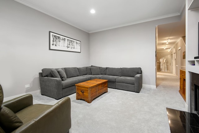 carpeted living room with ornamental molding