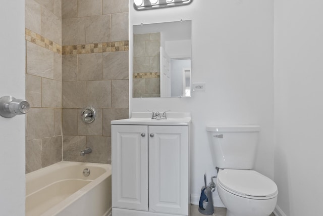 full bathroom featuring toilet, shower / washtub combination, vanity, and baseboards