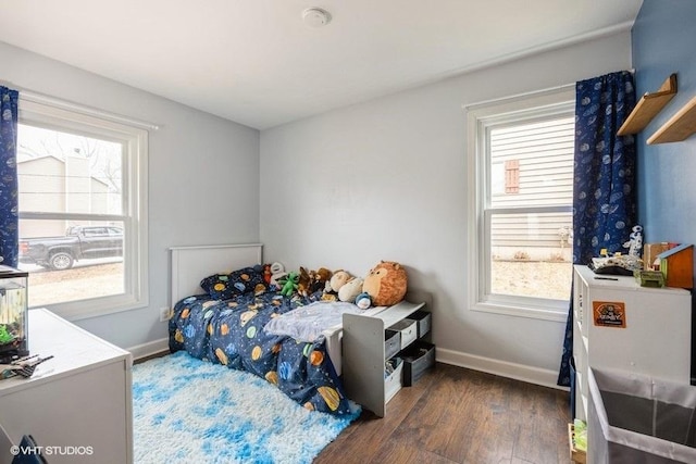 bedroom featuring dark hardwood / wood-style floors