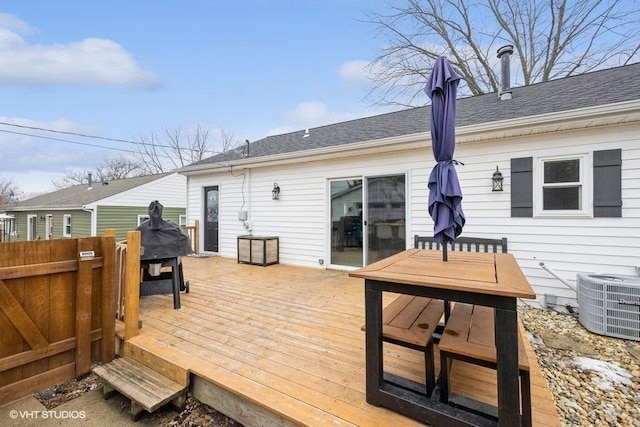 wooden terrace featuring central air condition unit