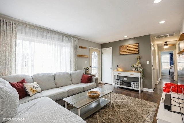 living room with dark wood-type flooring