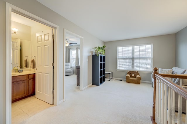 3460 Bradbury Cir, Aurora, IL 60504 - bedroom featuring light carpet, baseboards, and ensuite bath