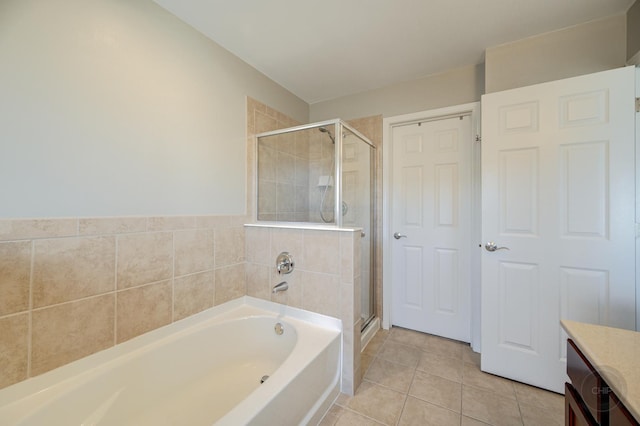 3460 Bradbury Cir, Aurora, IL 60504 - full bath featuring vanity, a garden tub, a stall shower, and tile patterned flooring